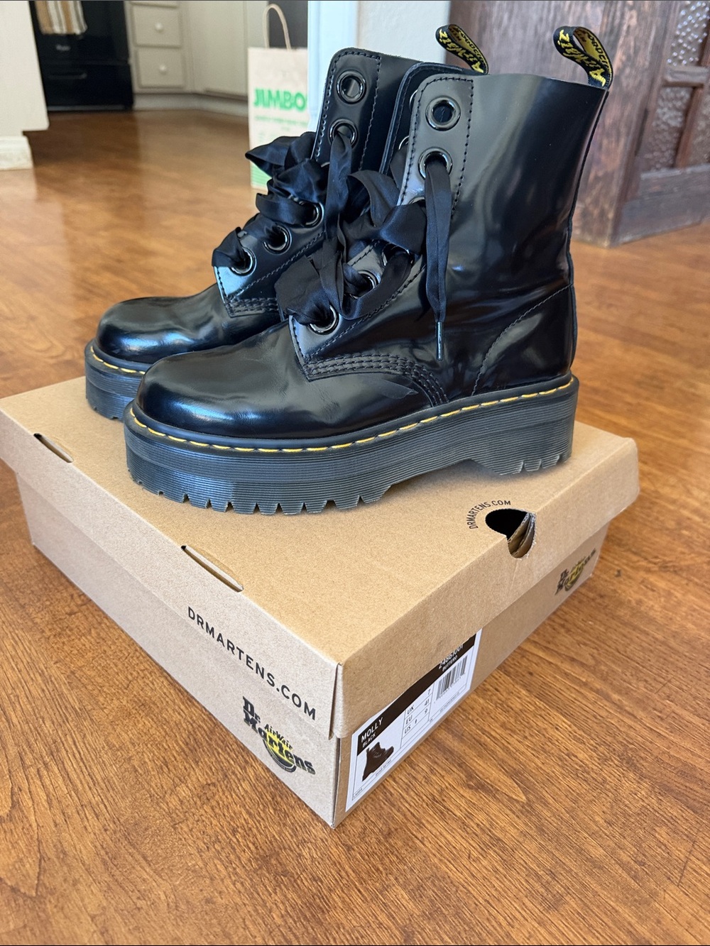 Dr. Martens Black Patent Platform Boots with Yellow Welt Stitching